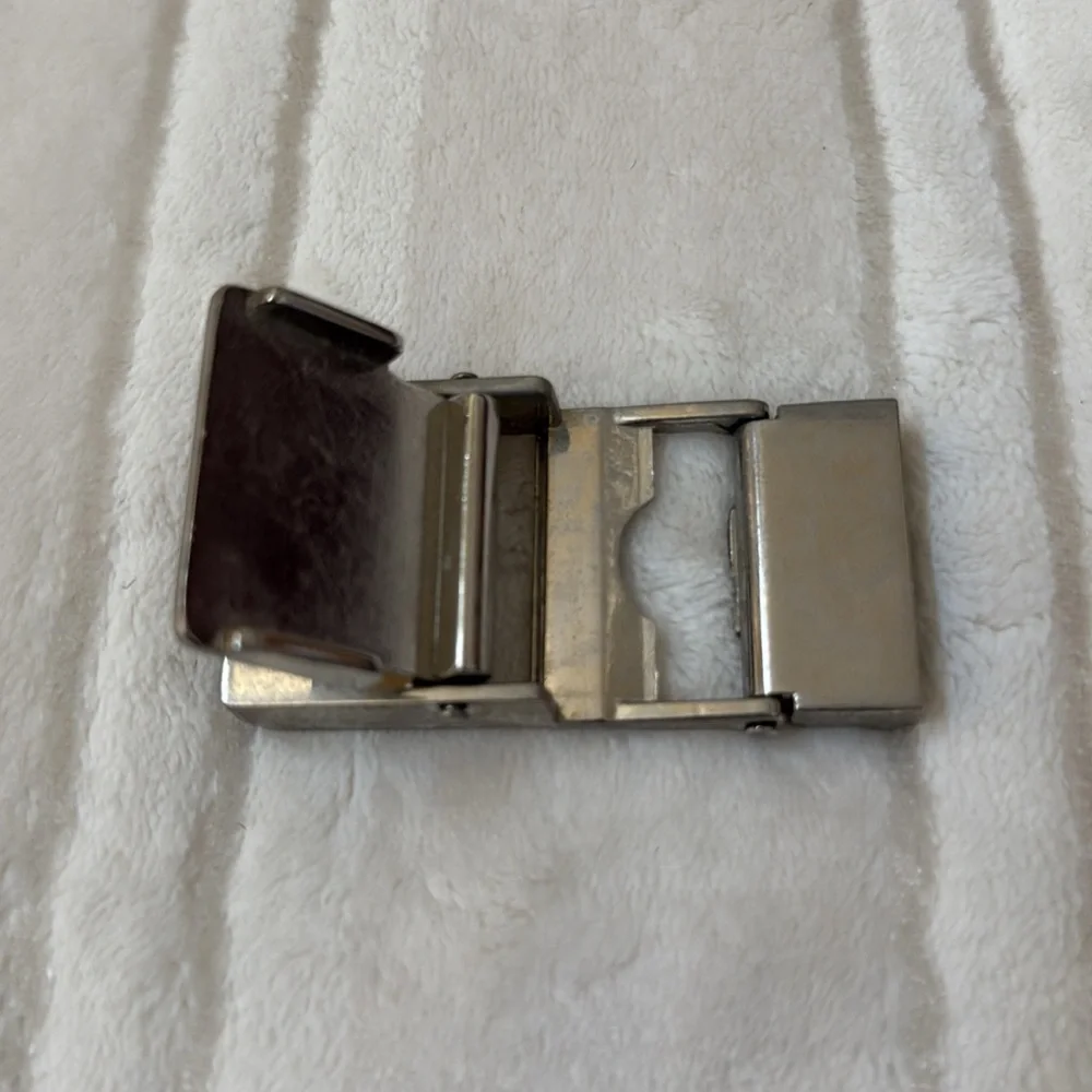 Vintage Gucci Silver Belt Buckle with the iconic 